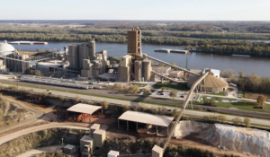 Video production case study cover featuring an aerial photo of the Continental Cement Davenport Plant